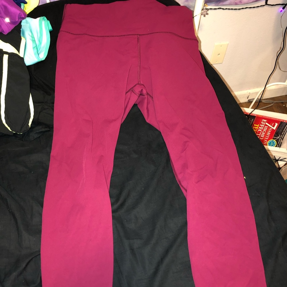 Pink lululemon leggings and white lulu shirt